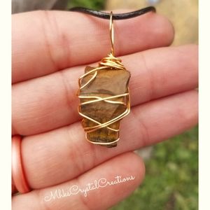 SOLD⭐Raw rough cut tigers eye crystal necklace.